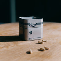 Hē Labs Unwind capsules - adaptogen stress supplement for men's composure and cortisol balance